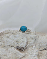 Small oval turquoise ring