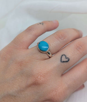 Small oval turquoise ring