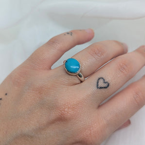 Small oval turquoise ring