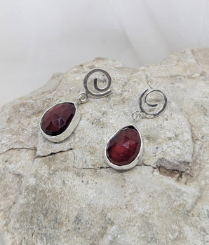 Spiral and garnet earrings