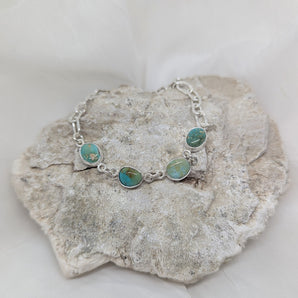 four turquoise bracelet