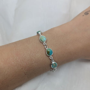 four turquoise bracelet