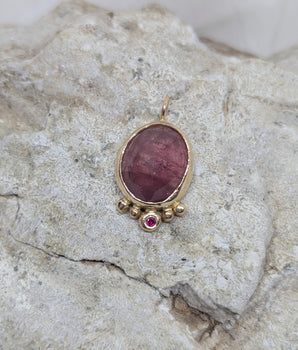 Pink tourmaline and ruby gold pendant