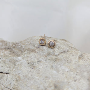 Stud gold earrings and diamond