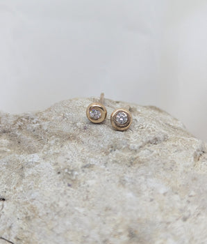 Stud gold earrings and diamond