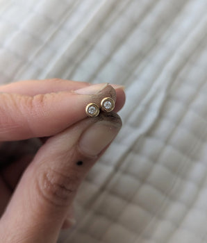 Stud gold earrings and diamond