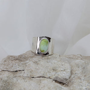 Thick silver ring with green turquoise