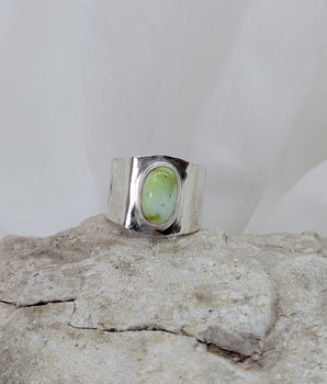 Thick silver ring with green turquoise