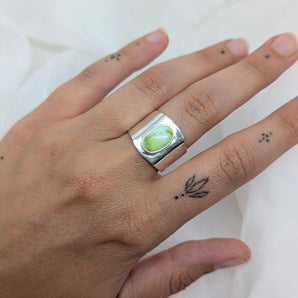 Thick silver ring with green turquoise