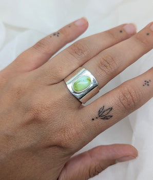 Thick silver ring with green turquoise