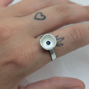 Silver flower ring with lapis